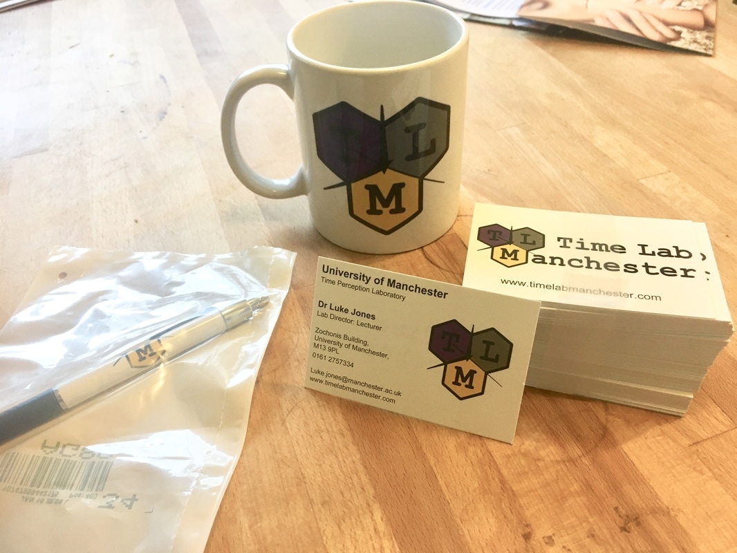 Original Time Lab promotional materials featuring the TLM logo